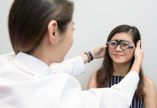 Doctor Checking the Eyes of a Woman
